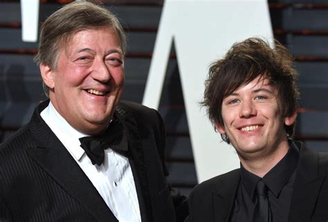 Stephen Fry wants to start family with husband Elliott Spencer