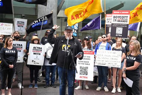 Steps from TIFF, striking actors, writers rally at Canadian offices for Apple, Amazon