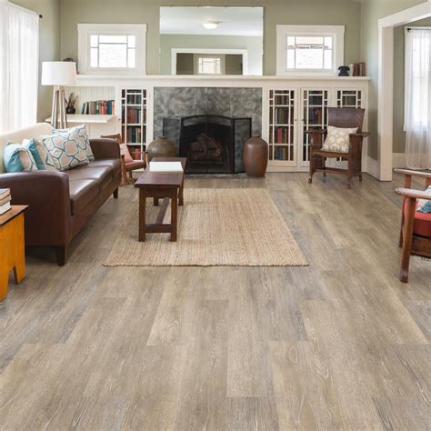 14. Wide Plank. Go wide to give your living room a more spacious affect. Wide plank wood flooring means fewer seams between the planks and more natural wood characteristics to enjoy. The Bonafide Supreme Wide Collection takes its planks to 9 ½ inches in this rustic wood look.