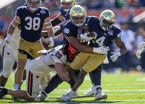Steve Angeli throws for 3 TDs, No. 15 Notre Dame beats No. 21 Oregon State 40-8 in Sun Bowl