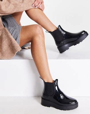 Steve Madden sahara patent welly boots in black ASOS