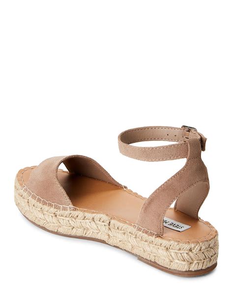 Steve Madden Urge Espadrille Sandal. Elevate your warm weather looks with the cool vibes of the Urge espadrille sandal by Steve Madden. This wedge sandal comes with open toe for an airy feel and braided detailing to pull off that chill casual style in your summer outfits. Item # 521992; UPC # 195945819333 