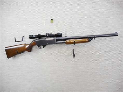 This listing features a Stevens Model 87A .22 short, long, or long rifle Semi-Automatic Rifle. This Model 87A is in very good condition and features; 24" blued barrel, blued receiver, straight walnut stock, height adjustable rear iron sights, and appears to have a new magazine tube. The gloss finish has started to fade on some spots of the .... 