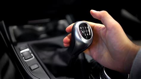 Stick shift. A gear stick (rarely spelled gearstick ), [1] [2] gear lever (both UK English ), gearshift or shifter (both U.S. English ), more formally known as a transmission lever, is a metal lever attached to the transmission of an … 