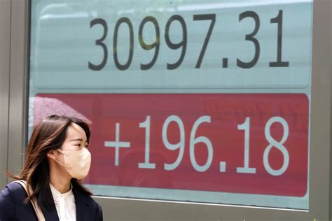 Stock market today: Asian markets mixed as US government debt talks push toward brink of default