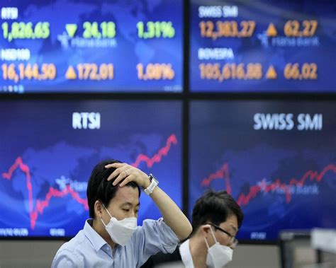Stock market today: Asian shares are mostly lower as Australia’s central bank raises its key rate