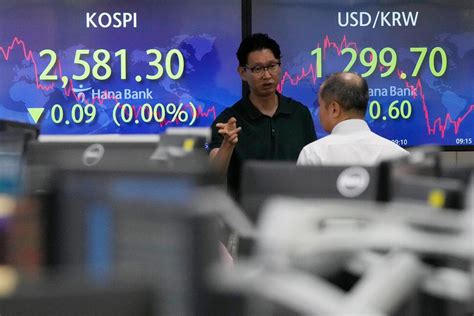Stock market today: Asian shares mixed after S&P 500 slips ahead of Fed interest rate decision