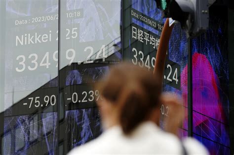 Stock market today: Asian shares sink as central banks crank interest rates still higher