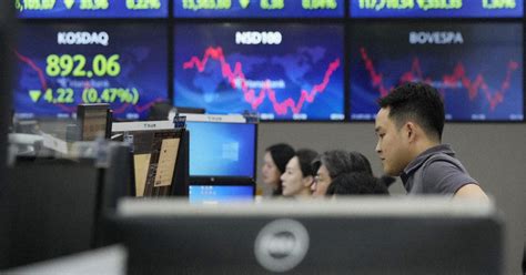 Stock market today: Asian shares turn lower after China economic data weaker than expected