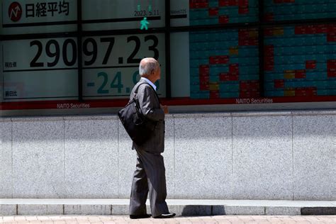 Stock market today: Global shares mixed in choppy trading after US inflation report