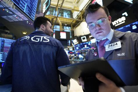 Stock market today: Wall Street drifts in mixed trading following earnings reports