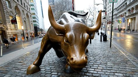 Stock market today: Wall Street edges higher to edge of a new bull market