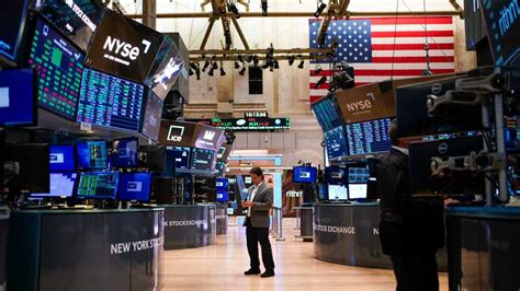 Stock market today: Wall Street rally fades as investors review upbeat economic, earnings reports