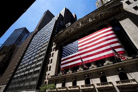 Stock market today: Wall Street wavers amid earnings updates