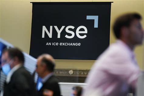 Stock market today: Wall Street wavers following strong consumer confidence report, Fed hopes