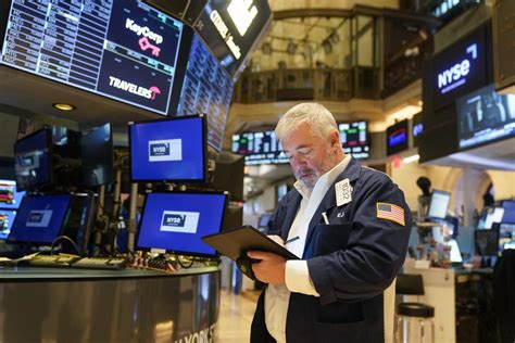 Stocks fall to cap chaotic week driven by fears about banks