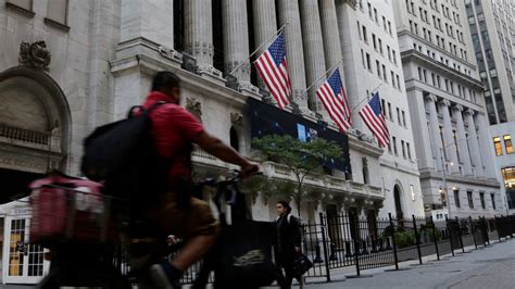 Stocks rise on Wall Street after bank deal, regulator moves