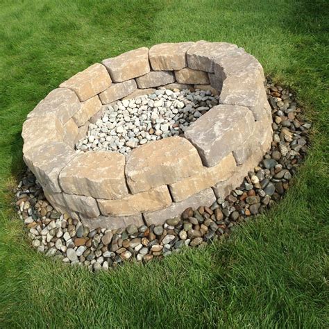 Stone firepit. The Fossil Stone Brown Fire Pit features a wide fire bowl and strong, stable concrete construction. This wood-burning fire pit helps provide an all-natural fuel option that can create a heating radius of up to 10.5 sq. ft. for your outdoor living area. The pit includes 24 wedge-shaped blocks and 12 top caps that are pre-cut for your … 