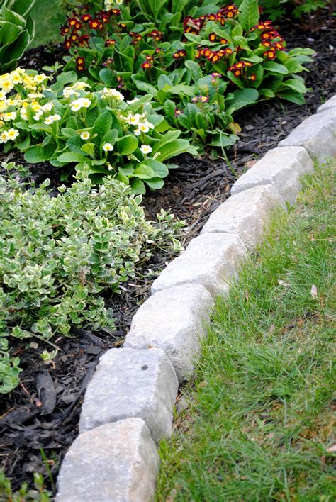 Stone flower bed edging. Edging with stones lets you give your landscape a defined, finished look and you can choose from stones in a variety of colors and styles. Follow the steps below … 