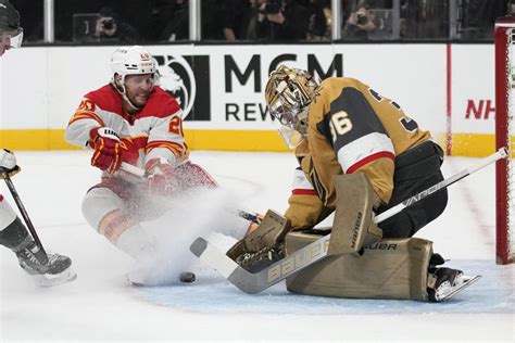 Stone scores twice, one in OT, lifts Golden Knights to 5-4 win over Calgary