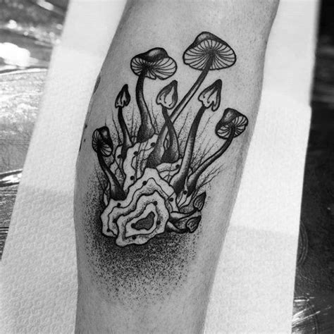 The magic mushroom association. Mushroom tattoos are often associated with hallucinogenic magic mushrooms or psychedelic mushroom drugs. A magical mushroom has been used for centuries in many different cultures as a way to induce a hallucination or psychedelic trip, see the dead and even shape a person's state of mind.. 