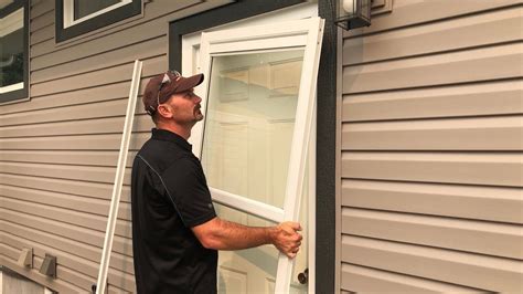 Storm door install. Replacing your front door is expensive. If you live in an area with lots of inclement weather, it may decrease the longevity of your front door. Installing a storm door keeps your main door looking great and lets you enjoy it much longer. AE Door and Window will custom-make your storm door to make it fit your main door perfectly. 