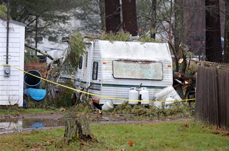 Storm pummels Massachusetts: 89-year-old man killed when tree falls on trailer, hundreds of thousands without power