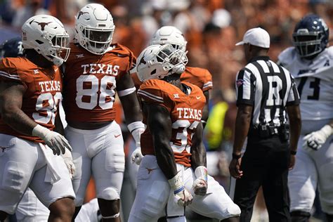 Stout defense lifts No. 11 Texas Longhorns to 37-10 win over Rice in season opener