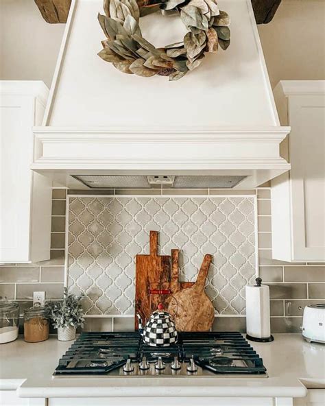 Stove against wall backsplash.  A well-designed backsplash behind the stove creates ...