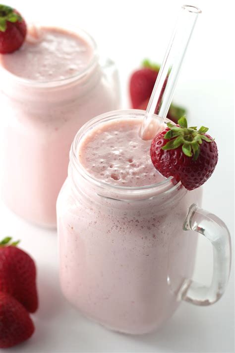 Strawbearie.milk. Then transfer it to a food processor or blender and puree until smooth. Strain the strawberry puree through a fine-mesh sieve lined with cheesecloth, pressing out as much liquid as possible. Discard the seeds. Divide the strawberry sauce between two glasses and top each glass with 1¼ cups of milk. Stir to incorporate. 