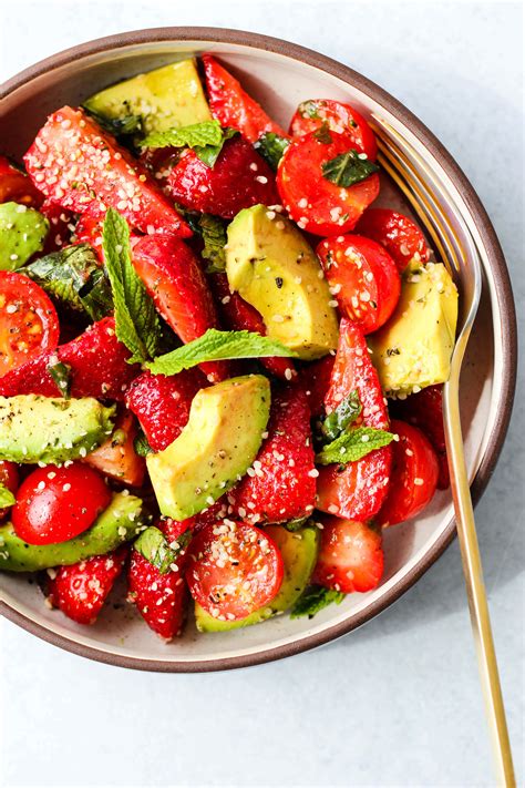 Strawberry avocados. Add pecans to a large skillet over medium heat. Toss for 3-4 minutes until toasted and fragrant. Remove from heat. Add spring mix, strawberries, avocado, feta and pecans to a large salad bowl. In a small bowl, whisk together olive oil, red wine vinegar, honey (optional), poppy seeds, ground mustard, salt, and pepper. Pour dressing over the salad. 