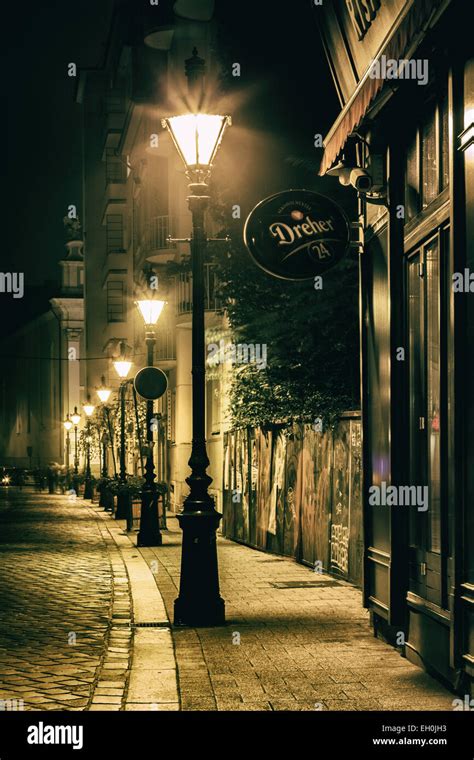 Street with lamps. A street light is like a mini powerhouse on a pole. It has several parts that help it shine brightly at night. At the top, you’ll find the light fixture, which holds either an … 