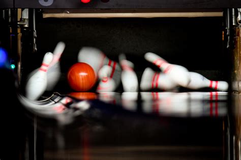 Strike in bowling. A single game consists of 10 frames. Each frame gives the bowler two opportunities to knock down 10 pins. With each pin the bowler knocks down, a point is awarded. You can score bonus points by bowling “strikes” and “spares.”. With a game consisting of 10 frames, the maximum score you can get is 300 points. 