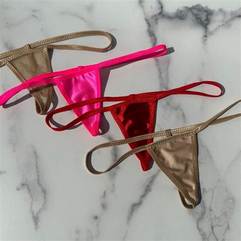 String bikini anus.  These can be new micro bikinis, thongs, mini G-strings, plug strings, sc...