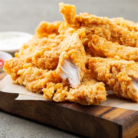 Strips chicken. Advantages of Chicken Strips: Ease of Consumption: Chicken strips are easier to eat than wings, making them a convenient option for quick meals or snacks. Versatile Dipping Options: Chicken strips pair well with a wide variety of dipping sauces, from classic ranch to tangy honey mustard, allowing for endless flavor combinations. 
