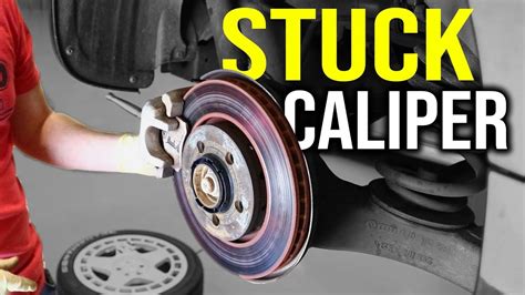 Stuck brake caliper. Step 2: Loosen and Remove the Wheel. Use the lug wrench to loosen the lug nuts on the wheel with the stuck brake caliper. Next, use the jack to lift the vehicle off the ground and place the jack stands under the vehicle for support. Then remove the lug nuts and wheel. 