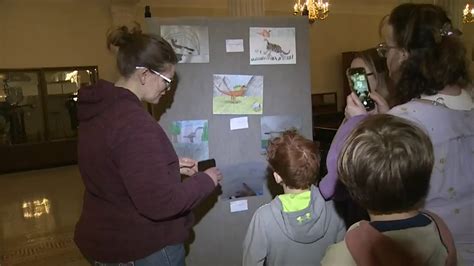 Student drawings of official Massachusetts state dinosaur now on display at State House
