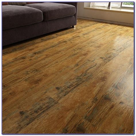 Menards® offers a variety of laminate wood flooring as a more durable alternative to hardwood floors and laminate tile flooring to achieve the stone look you desire. We carry a large selection of underlayment to absorb sound and prevent moisture damage as well as laminate floor moulding and trims to create a clean, cohesive look.. 