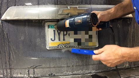 Successful license plate theft followed by unsuccessful break-in attempt