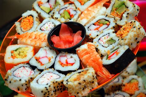 Suchi - Mashed avocado is rolled up with raw salmon, white rice, sushi vinegar, avocado, pickled ginger, sesame seeds, seaweed, and lettuce ( 10 ). Two to three pieces (100 grams) of salmon avocado roll ...
