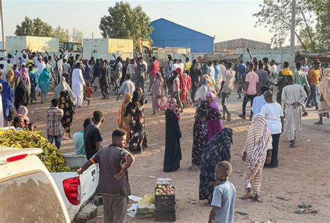 Sudan’s conflict reaches a key city that had been a haven for many. Aid groups suspend work or flee