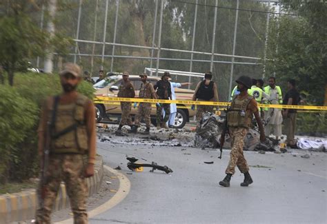 Suicide bomber targets truck carrying troops in northwestern Pakistan, wounding 8 people