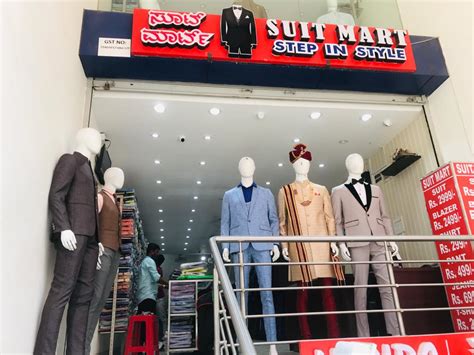 Suit mart. SuitMart - South Main in Houston, TX offers a wide selection of wedding attire for men, including suits, dress shirts, and ties. Their Valentine's Day promotion features stylish red blazers starting at $79 and suit packages for $149.99. 