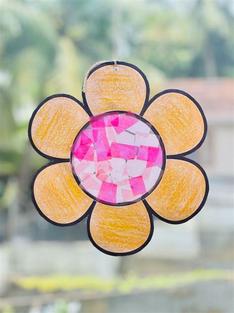 Suncatcher craft for kids with tissue paper (free template available ...