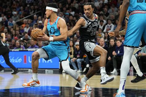 Suns clinch playoff spot, rout injury-riddled Spurs 115-94