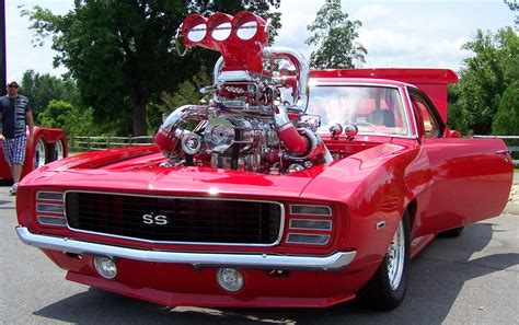 Supercharged cars. A supercharger is just a mechanically driven way to pressurize intake air, thus increasing the density of the air. More air means more fuel, resulting in a more powerful combustion that we recognize as increased horsepower. The supercharger is driven directly by the engine crankshaft, either with a belt, chain, gears, or driveshaft. 