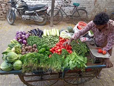 Suratcitynews on Instagram: "The local vegetable vendor, the girl …