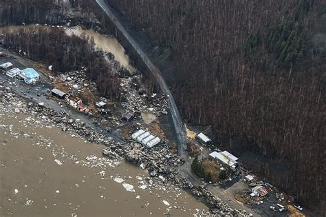 Surging Alaska rivers leave behind huge chunks of ice, damaged homes