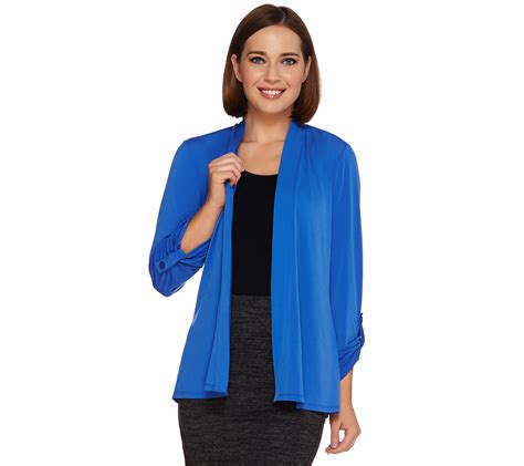 From Susan Graver. Includes cardigan and tank top; Cardigan Fabrication: knit; Cardigan Features: 3/4-length sleeves, allover print, ruched elastic, hi/low hem; Cardigan Fit: semi-fitted; follows the lines of the body with added wearing ease; Cardigan Length: missy length 27-1/2" to 29-5/8"; plus length 30-1/2" to 34". 