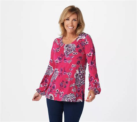 Lace trim adds a look-good, feel-good touch to this elbow-length sleeve top. From Susan Graver. Fabrication: knit. Features: scoop neckline, elbow-length sleeves with lace trim. Fit: semi-fitted; follows the lines of the body with added wearing ease. Length: missy length 25-1/2" to 27-5/8"; plus length 28" to 31-1/2".
